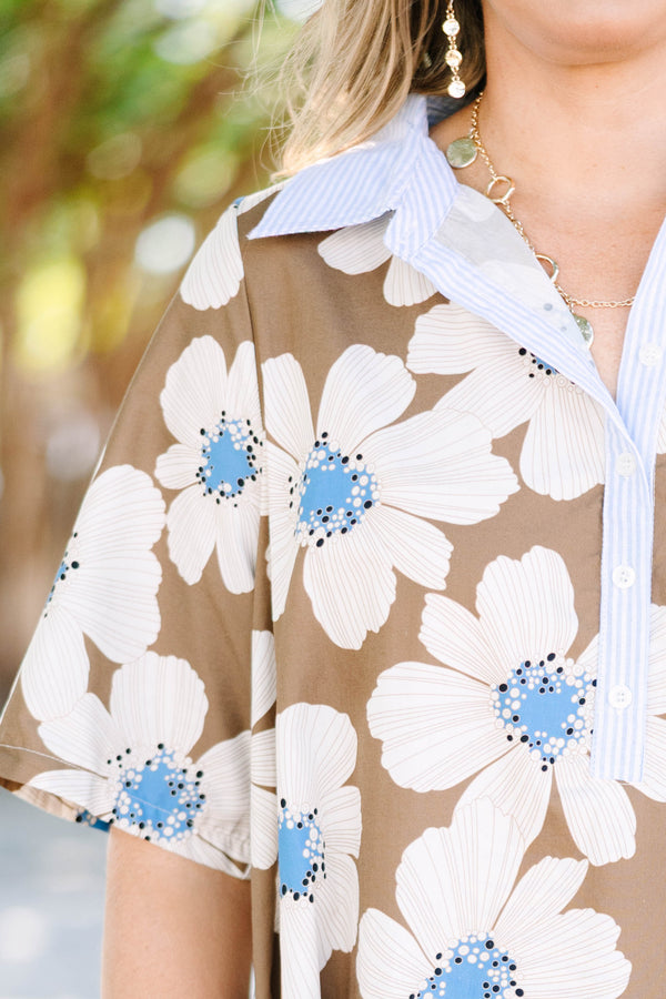 Plus size Human Nature Dress in brown with a white floral print, flowy fit, and collared neckline.