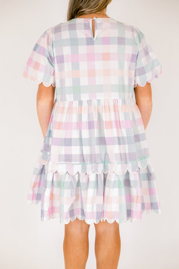 Chic Soul plus size clothing, pastel plaid knee length dress that has two tiers that both have a scalloped ruffle detail at the bottom of each tier scalloped detailing at the end of each sleeve