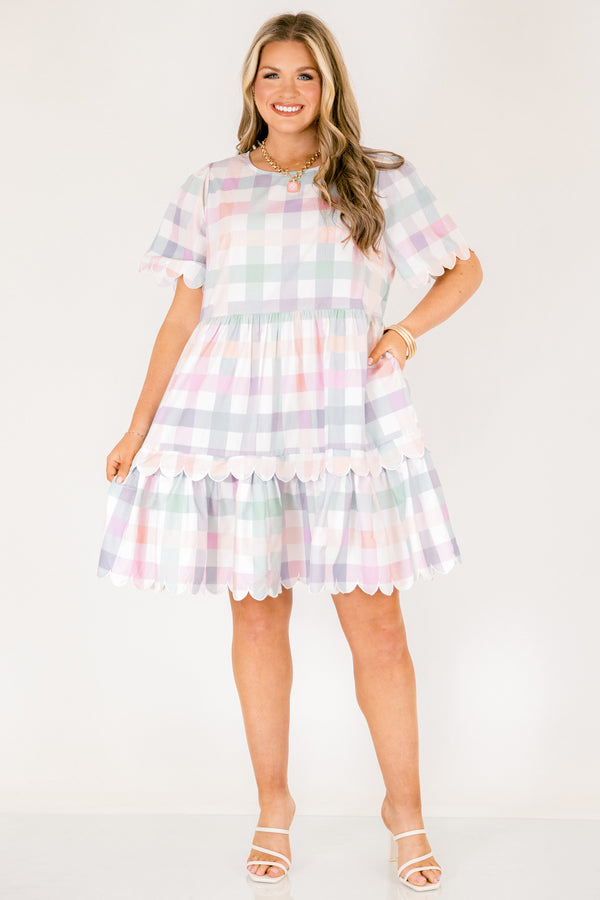 Chic Soul plus size clothing, pastel plaid knee length dress that has two tiers that both have a scalloped ruffle detail at the bottom of each tier scalloped detailing at the end of each sleeve