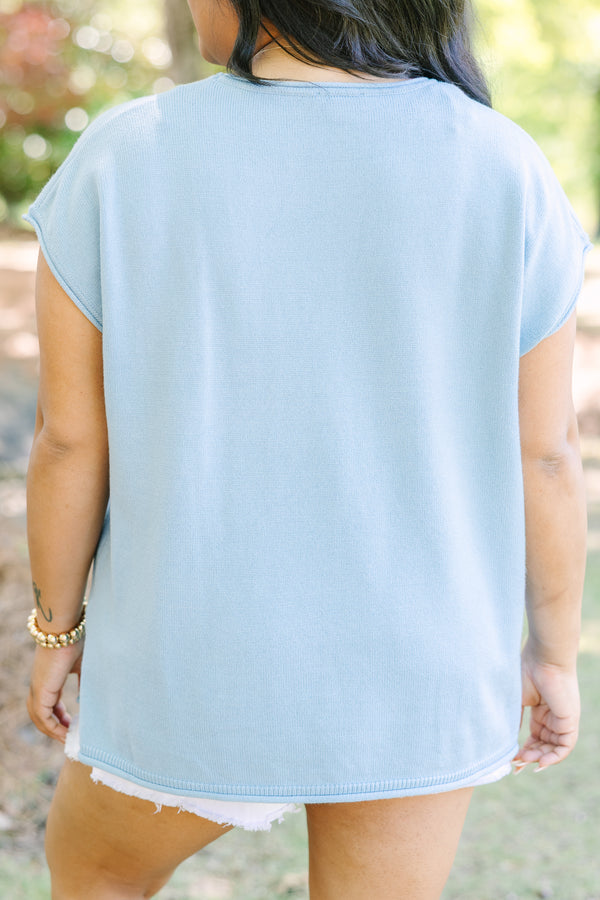 Plus Size light blue cap sleeve knit sweater with a round neckline and side slits.