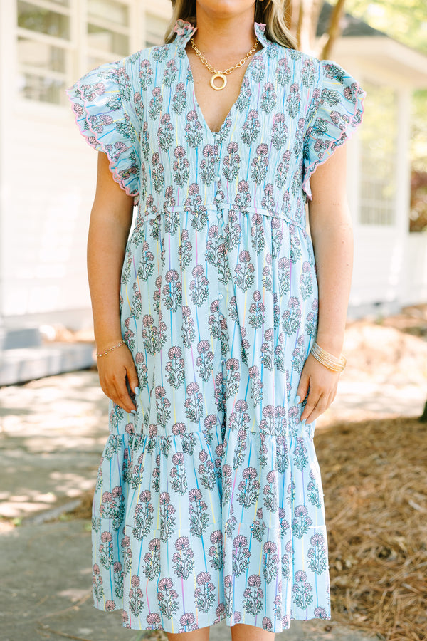 Chic Soul plus size clothing, blue midi dress with futter sleeves and a deep v-neckline as well as a pink floral block pattern throughout 
