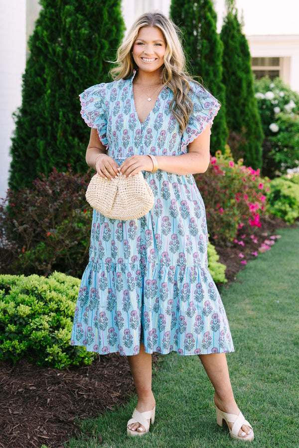 Chic Soul plus size clothing, blue midi dress with futter sleeves and a deep v-neckline as well as a pink floral block pattern throughout 
