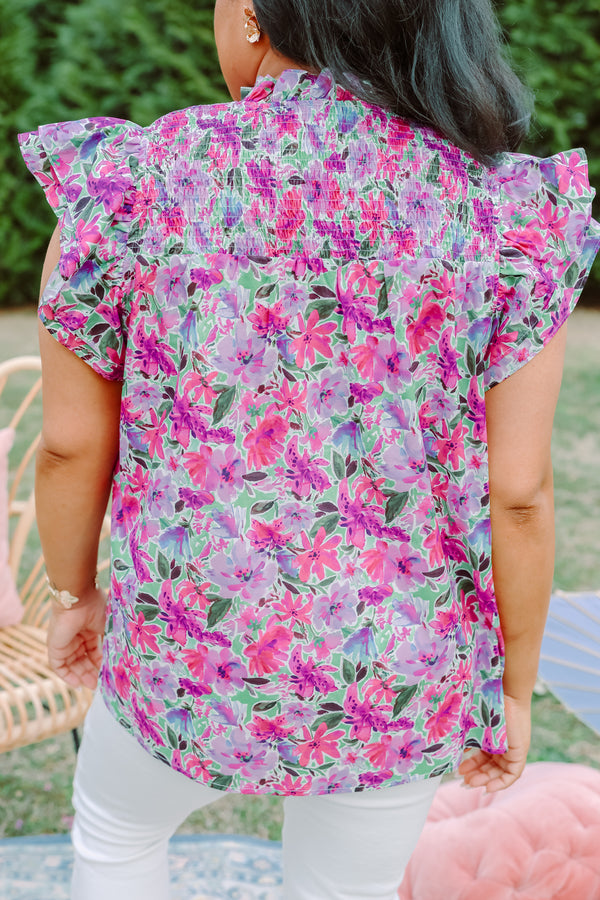 Plus Size purple floral top with smocking detail and flutter sleeves.