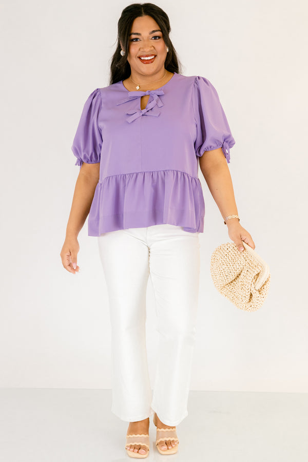 Plus Size purple peplum babydoll top with bow neckline details and elastic puff sleeves.