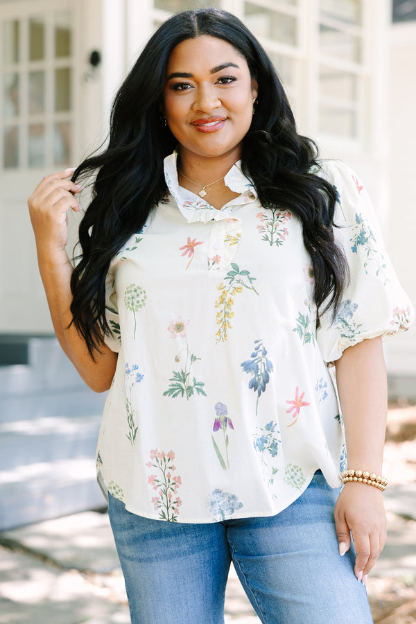 Plus Size ivory floral print top with puff sleeves, a ruffled collar, and button-down front.
