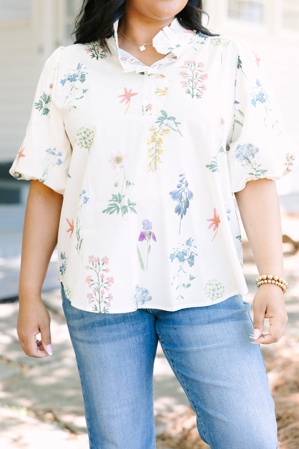 Plus Size ivory floral print top with puff sleeves, a ruffled collar, and button-down front.