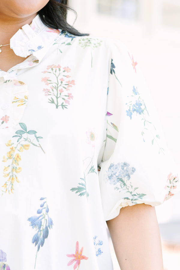 Plus Size ivory floral print top with puff sleeves, a ruffled collar, and button-down front.