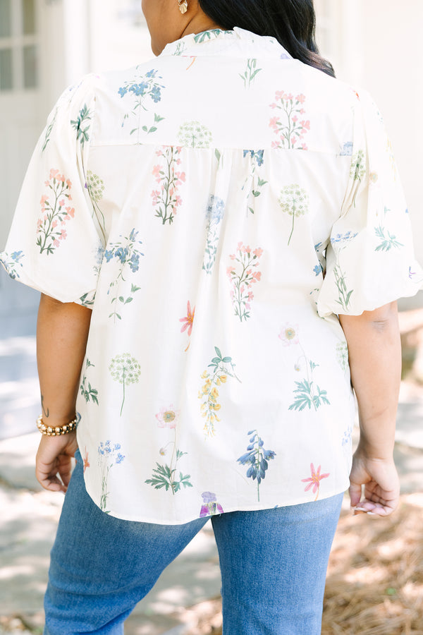 Plus Size ivory floral print top with puff sleeves, a ruffled collar, and button-down front.