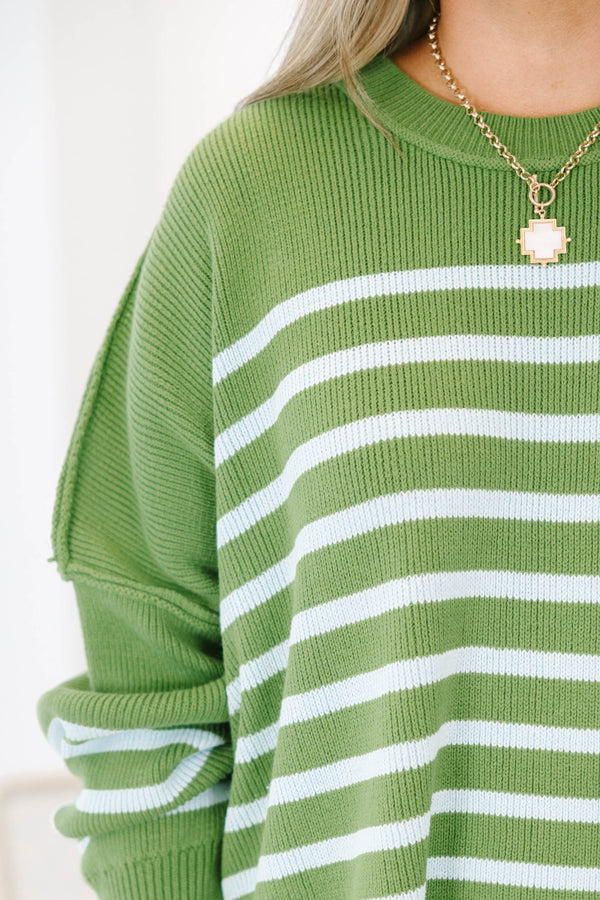 Plus Size olive green and white striped knit sweater with a crew neck and long bubble sleeves.