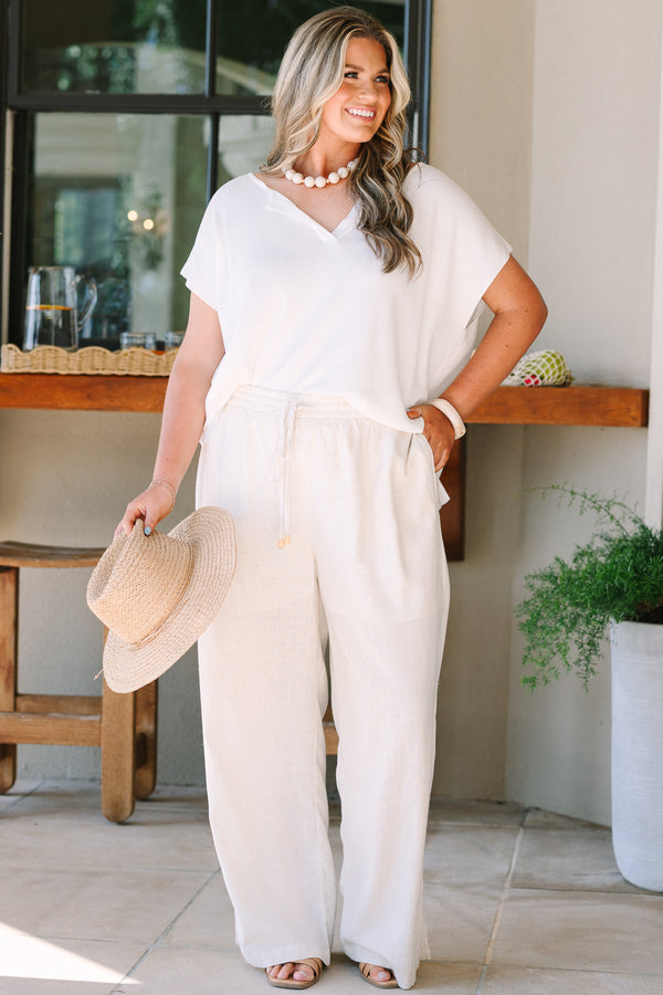 Plus Size short sleeve v-neck sweater in off-white with a relaxed fit and breathable fabric.