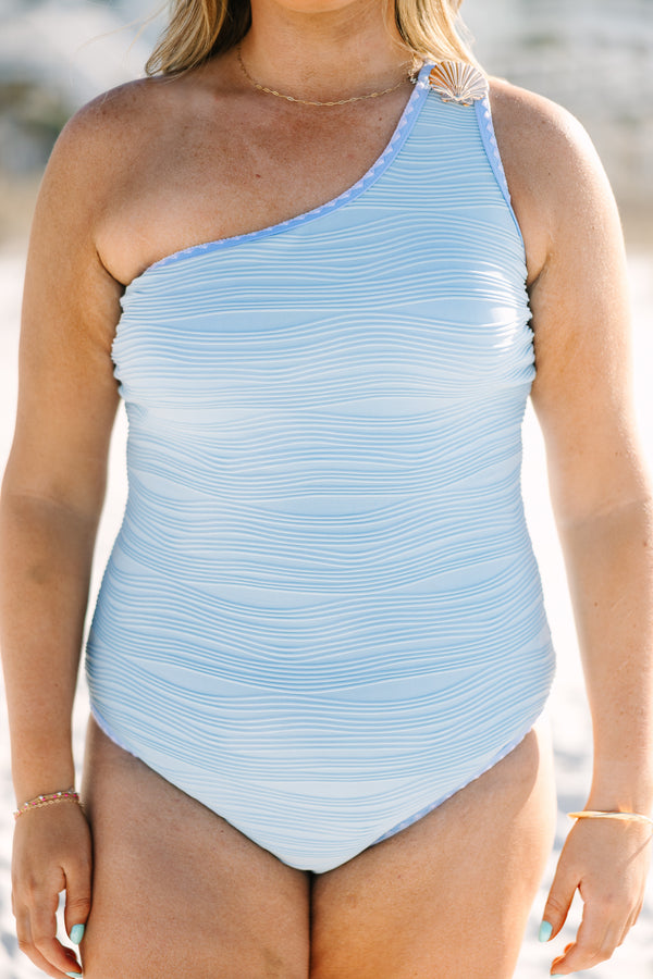 Chic Soul plus size clothing, aqua one shoulder one piece with a wavy texture throughout the swimsuit and a gold seashell charm on the one shoulder 