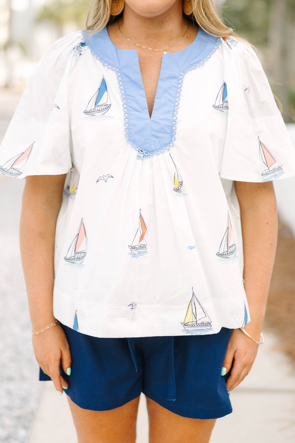 Chic Soul plus size clothing, white short flutter sleeve short sleeve top with v-neckline outlined in blue and small sailboat graphics 