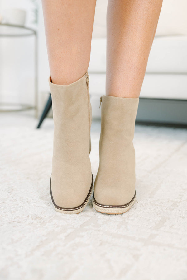 Apricot suede booties with a block heel and braided espadrille trim.