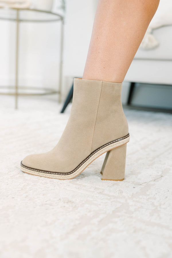 Apricot suede booties with a block heel and braided espadrille trim.