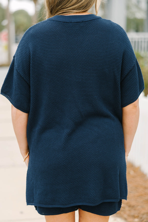 Chic Soul plus size clothing, navy blue short sleeve knit top with four wooden buttons along the v-neckline and navy blue shorts with elastic waistband to make a matching set
