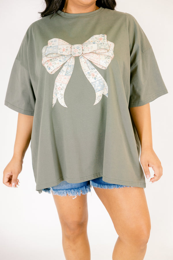 Chic Soul plus size clothing, dark olive green short sleeve boyfriend tee with patchwork patterned bow in the middle
