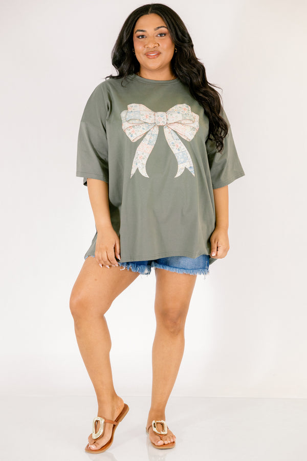 Chic Soul plus size clothing, dark olive green short sleeve boyfriend tee with patchwork patterned bow in the middle