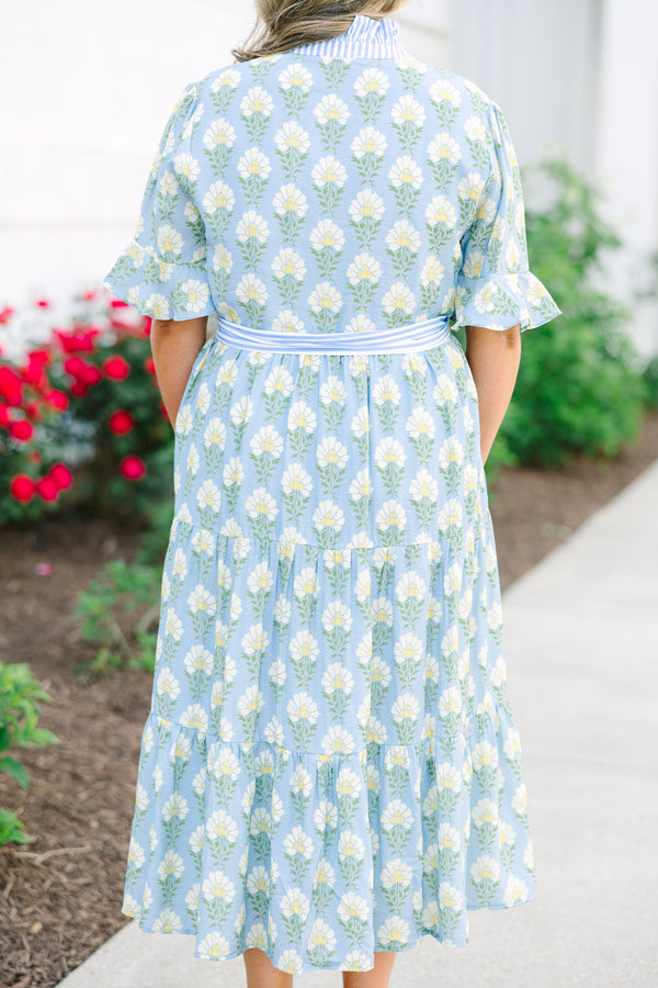 Plus Size blue floral midi dress with a ruffle collar, striped waist tie, and tiered skirt.
