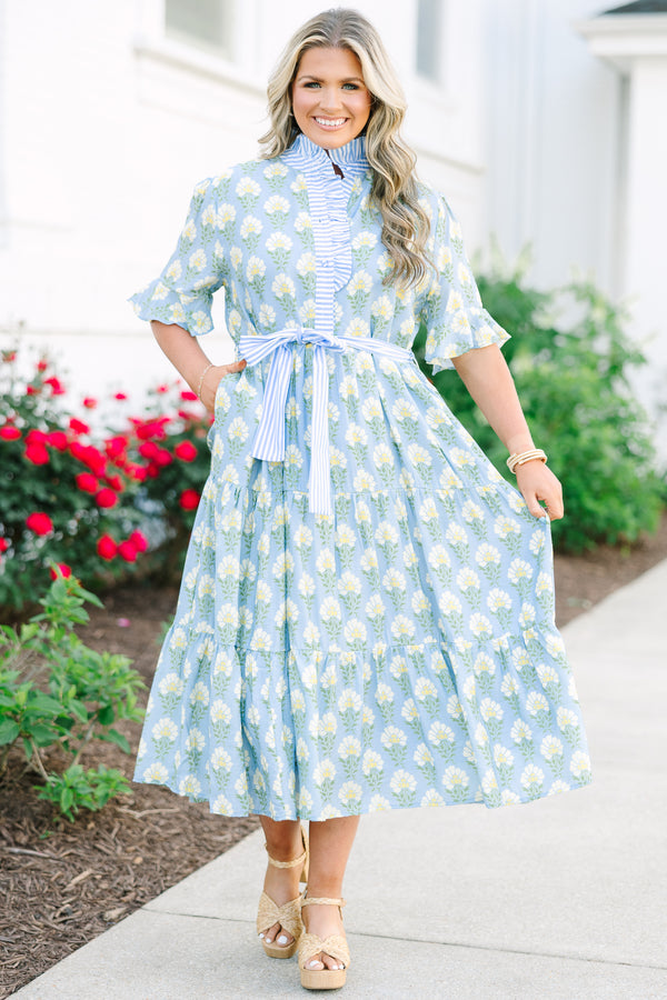 Plus Size blue floral midi dress with a ruffle collar, striped waist tie, and tiered skirt.