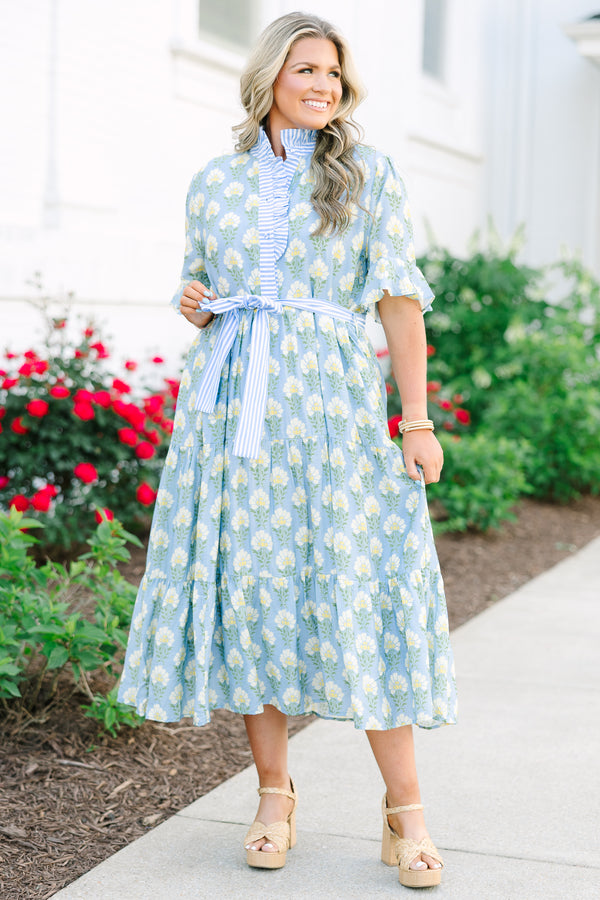 Plus Size blue floral midi dress with a ruffle collar, striped waist tie, and tiered skirt.