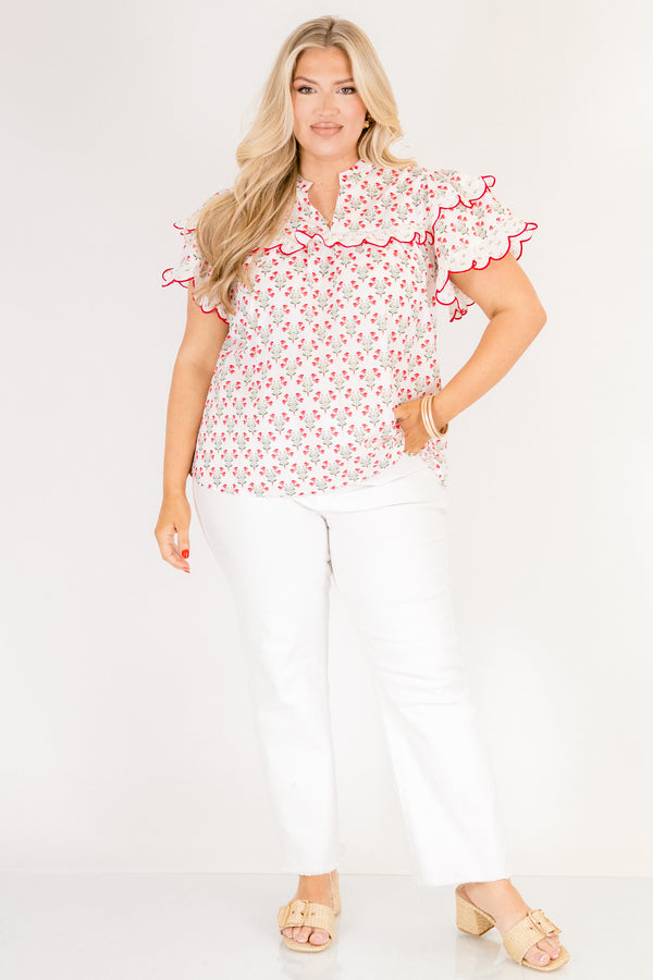 Chic Soul plus size clothing, white short flutter sleeve top with pink and green small floral pattern and pink scallop trimming along the sleeves through the top