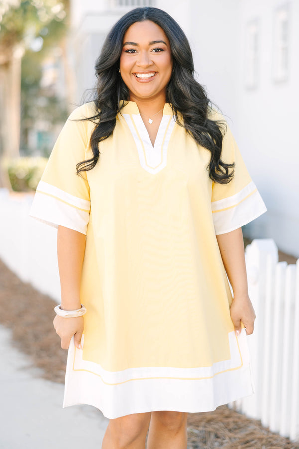 Chic Soul plus size clothing, yellow short sleeve straight cut dress with white trim along the hem, neckline, and sleeves