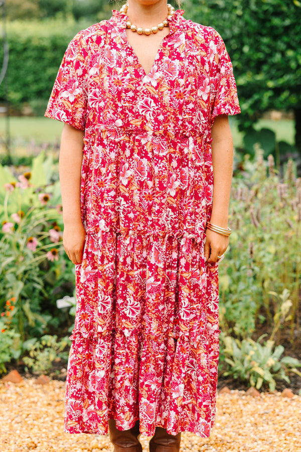 Plus Size pink floral tiered midi dress with short sleeves, a V-neckline, and a relaxed fit.