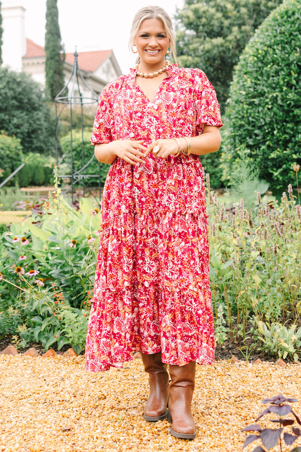 Plus Size pink floral tiered midi dress with short sleeves, a V-neckline, and a relaxed fit.
