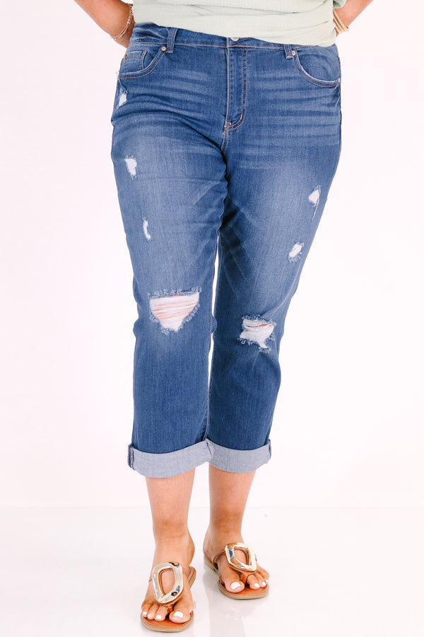 Chic Soul plus size clothing, medium wash distressed denim capris with cuffed hems.