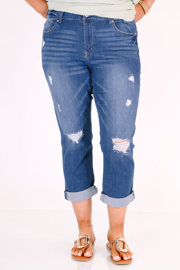 Chic Soul plus size clothing, medium wash distressed denim capris with cuffed hems.