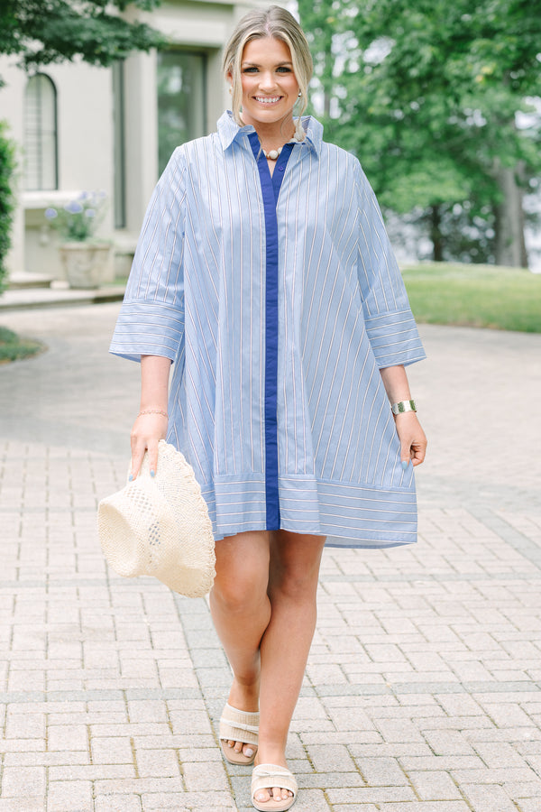 Plus size blue and white striped cotton shirt dress with three-quarter sleeves and a navy button placket.