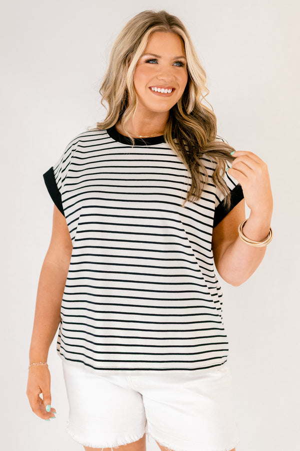 Chic Soul plus size clothing, cream short sleeve tee with black stripes as well as black cuffs at the end of each sleeve and black outlining the neckline of the tee 
