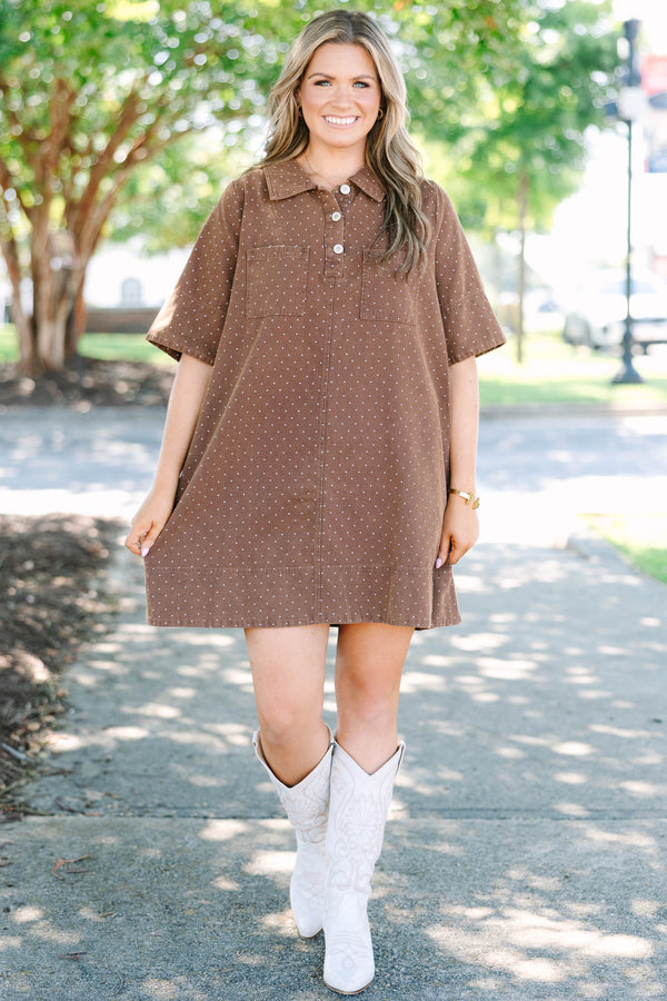 Plus Size brown short sleeve polo dress with white polka dots, collar, and front pockets.