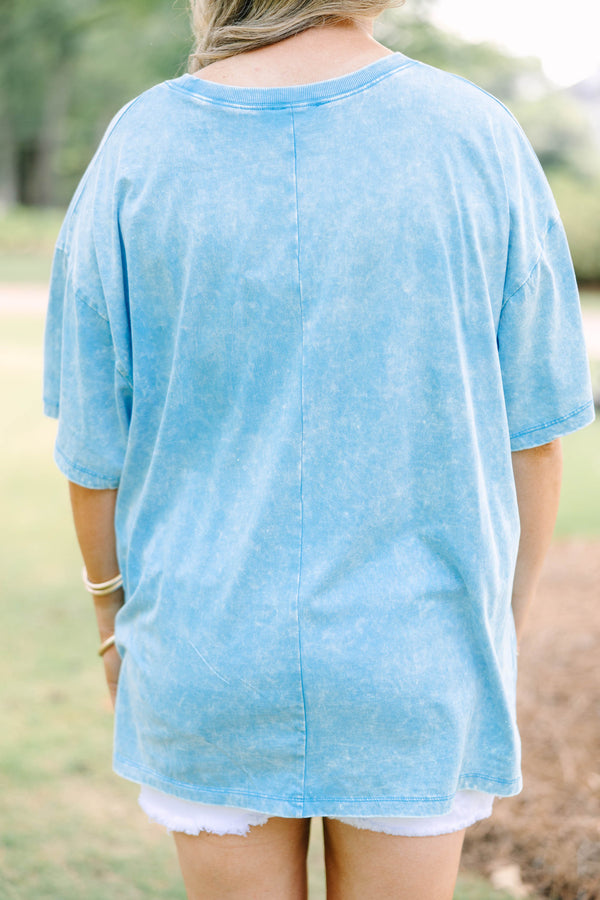 Plus Size vintage USA acid wash relaxed tee in deep sky blue with white star-patterned lettering.