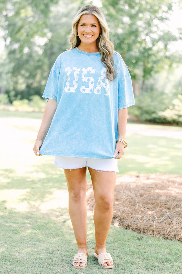Plus Size vintage USA acid wash relaxed tee in deep sky blue with white star-patterned lettering.