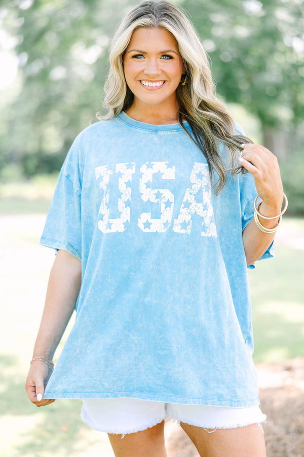 Plus Size vintage USA acid wash relaxed tee in deep sky blue with white star-patterned lettering.