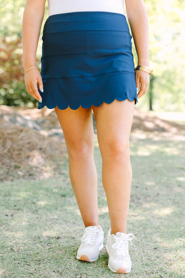 Plus Size navy blue athleisure skort with a scalloped hemline and comfortable pull-on design.