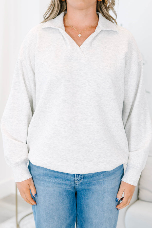 Plus Size light gray heather pullover with a relaxed fit, v-neck collar, and long sleeves.