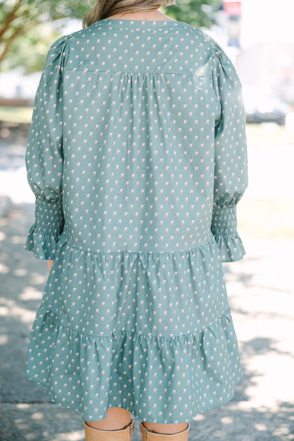 Plus Size green babydoll dress with a split v-neck, mini bell sleeves, and a floral polka dot print.