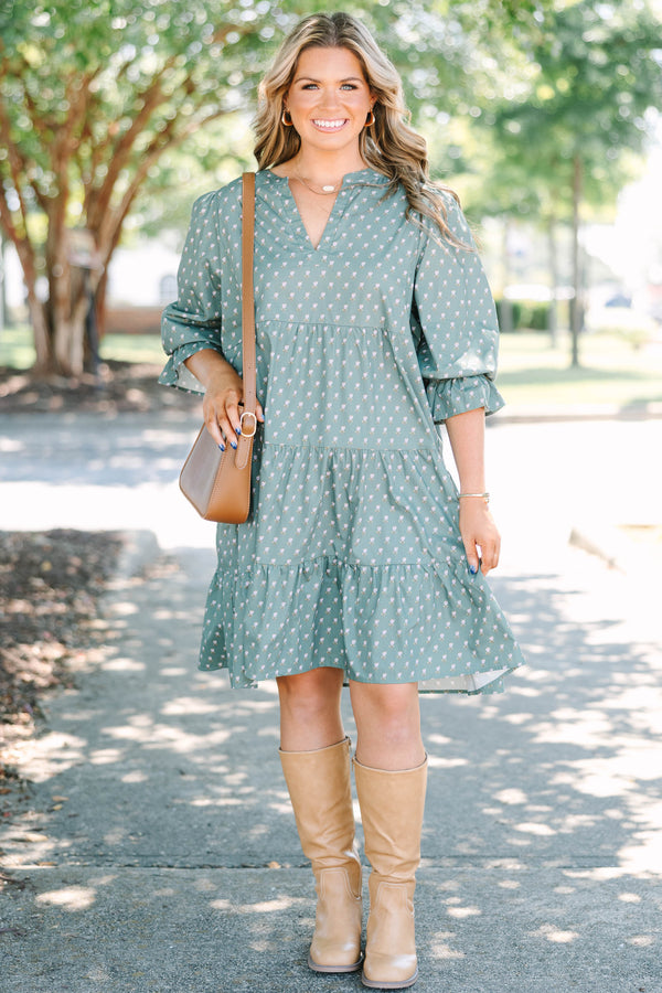 Plus Size green babydoll dress with a split v-neck, mini bell sleeves, and a floral polka dot print.