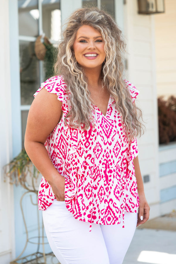 Chic Soul plus size clothing, white top with hot pink pattern and flutter sleeves