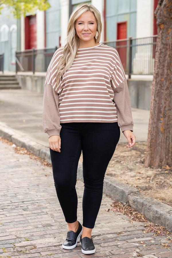 Plus Size mocha and white striped long sleeve top with a high neckline and relaxed fit.