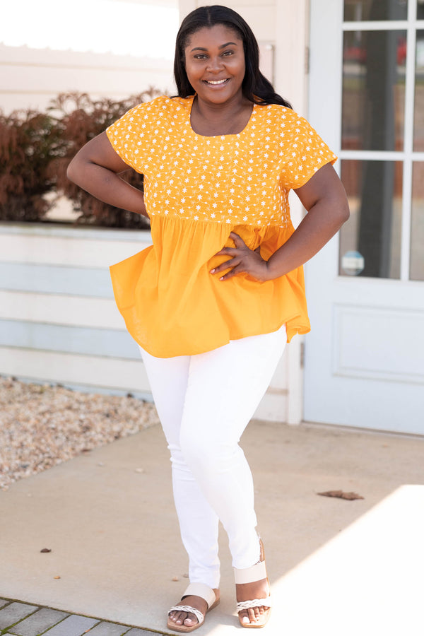 Chic Soul plus size clothing, orange babydoll style top with flower patterned bodice