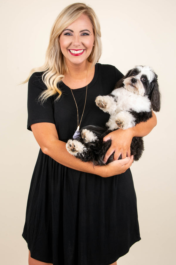 Plus Size black babydoll dress with short sleeves, a round neckline, and a breezy rayon-spandex fit.