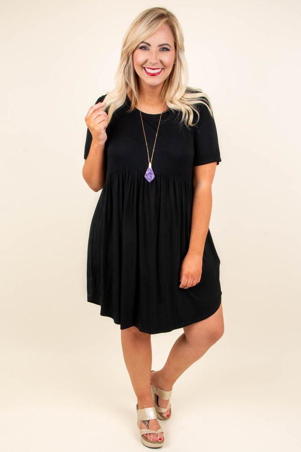 Plus Size black babydoll dress with short sleeves, a round neckline, and a breezy rayon-spandex fit.