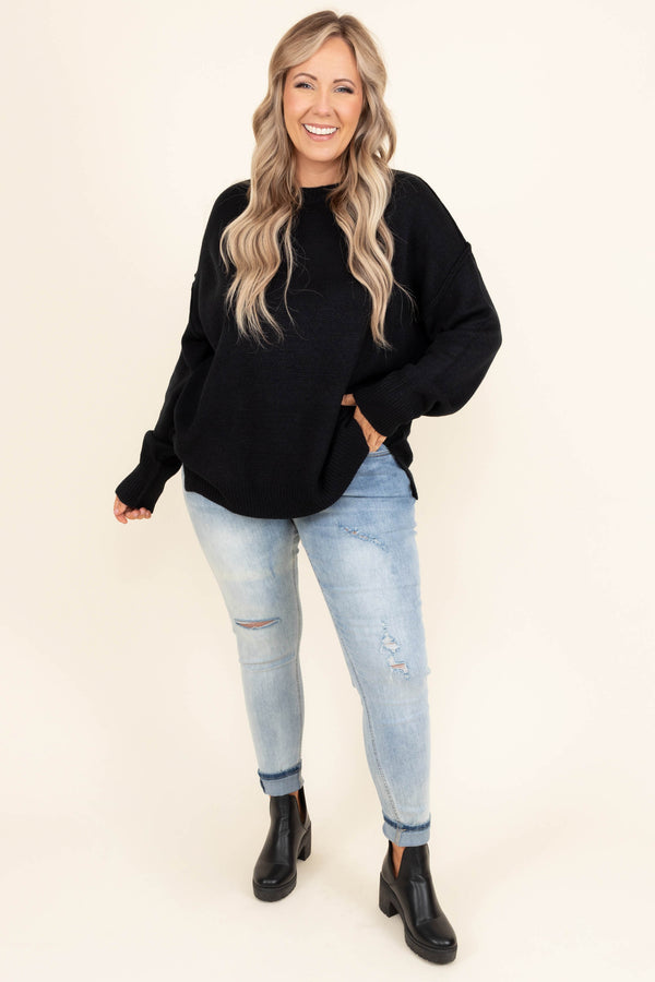 Chic Soul plus size clothing, mid-waisted light-wash denim slim-fitting jeans with light distressed detailing on the legs
