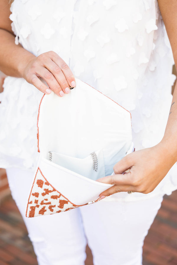 Chic Soul plus size clothing, tan and white beaded pattern clutch